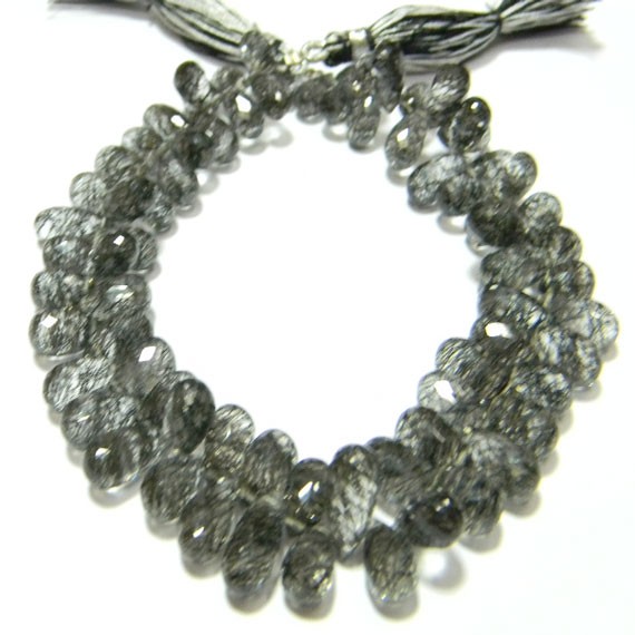 Manufacturers Exporters and Wholesale Suppliers of Very Fine Quality Black Rutile Faceted Drop Briolettes Jaipu Rajasthan